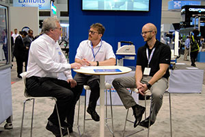 Doug Dalgliesh, business development manager at TM Robotics, with Scott White, PCI president (center) and Jon Health of PCI (right)
