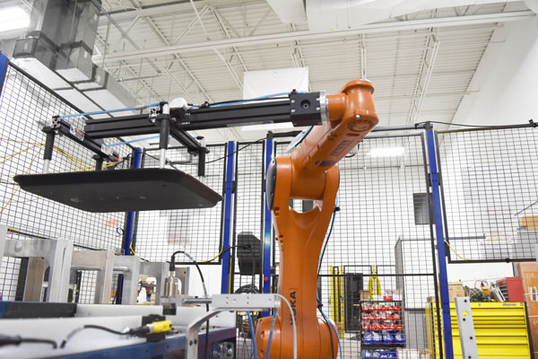 Industrial robot in a cell