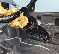Robotic Gluing Spreads Cost Savings